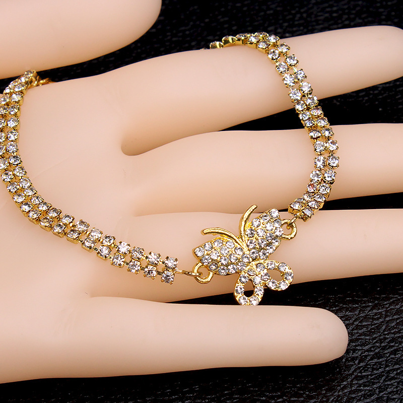 Europa y los Estados Unidos explotaron la personalidad creativa de mariposa joyería de playa para mujeres simple doble fila de joyería de pie de diamante lote spot