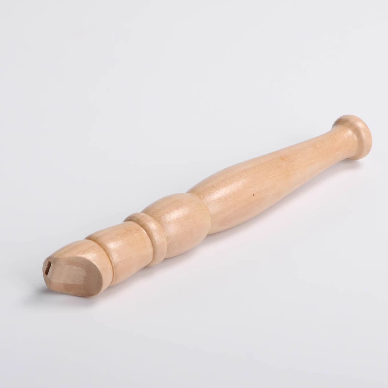 small wooden flute