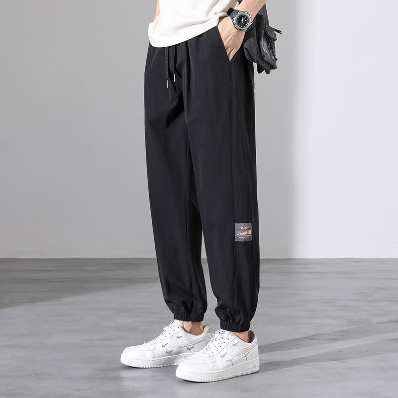 Men's casual sports pants, loose fit, trendy, thin summer style, cropped length, tapered leg, men's sweatpants wholesale.