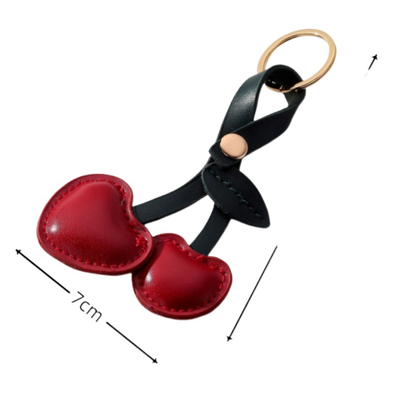 Nuevo estilo pastoral europeo y americano de cuero cereza llavero colgante hombres y mujeres bolsa de coche llavero colgante adornos