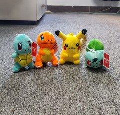 ポケモンのポケモンのポケモンのぬいぐるみのペンダントの小さい火の竜の人形のピカチュウのぬいぐるみのキーホルダーのおもちゃの新型です。