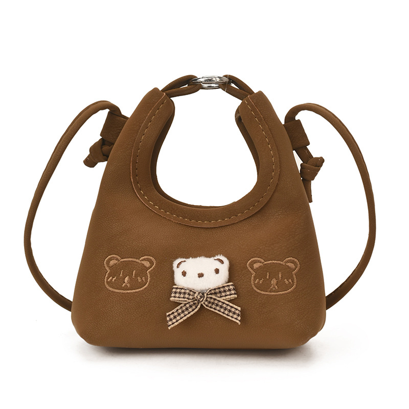 2026 nuevo bolso infantil de dibujos animados osos mini bolso de mano bebé adorable bolso de accesorios de niña pequeña