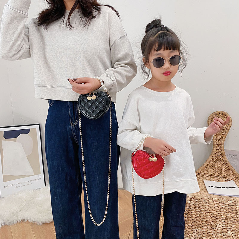 Bolso de mensajero en forma de corazón lindo para niñas 2021 nuevo bolso para niños estilo occidental perla portátil princesa mini Satchel