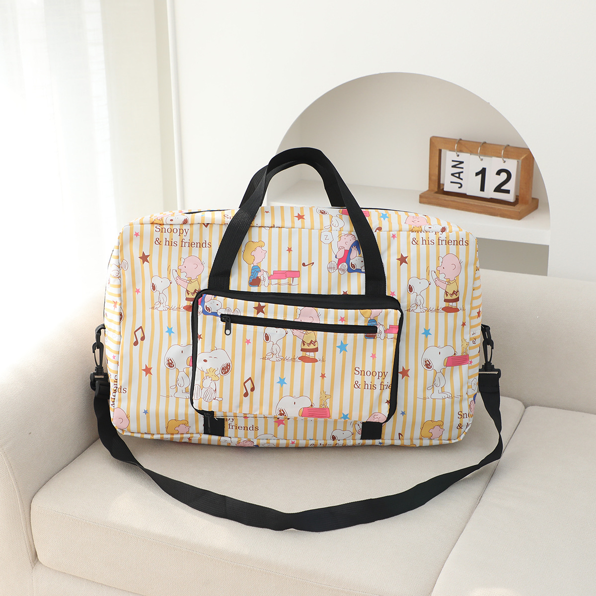 虹熊クロミ大容量手提げ旅行袋は旅行箱のポールに挿してもいいです。