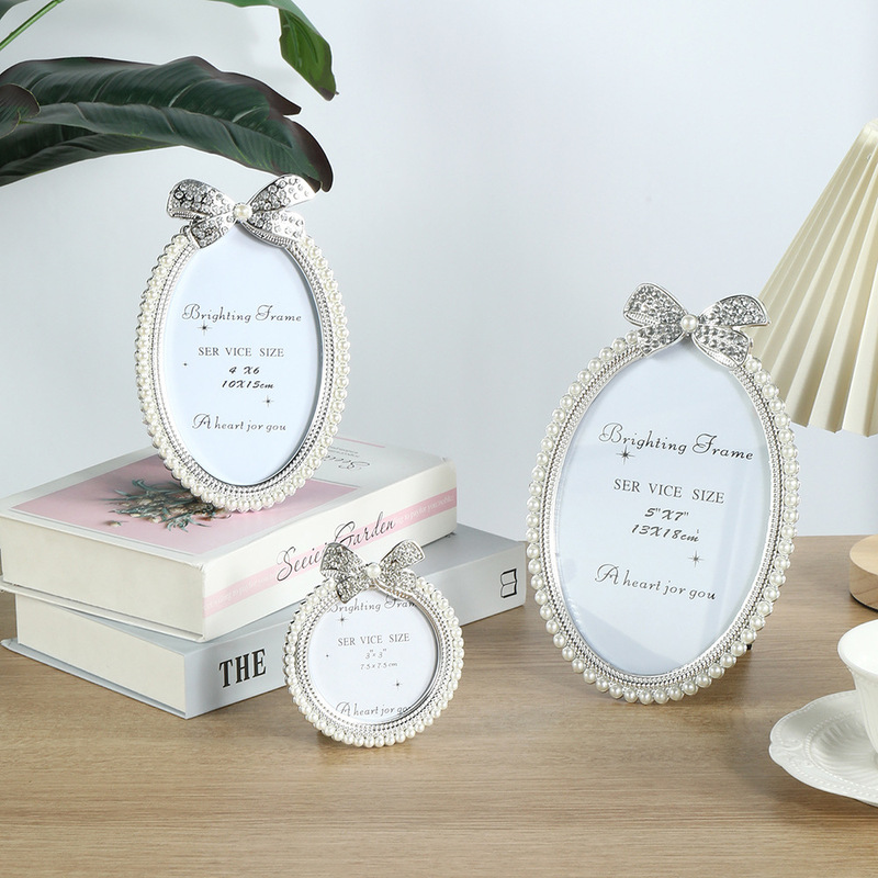 European creative bow White 3 inch children's photo frame Pearl 7 inch 2088 Oval photo frame direct wholesale European creative bow White 3 inch children's photo frame Pearl 7 inch 2088 Oval photo frame direct wholesale