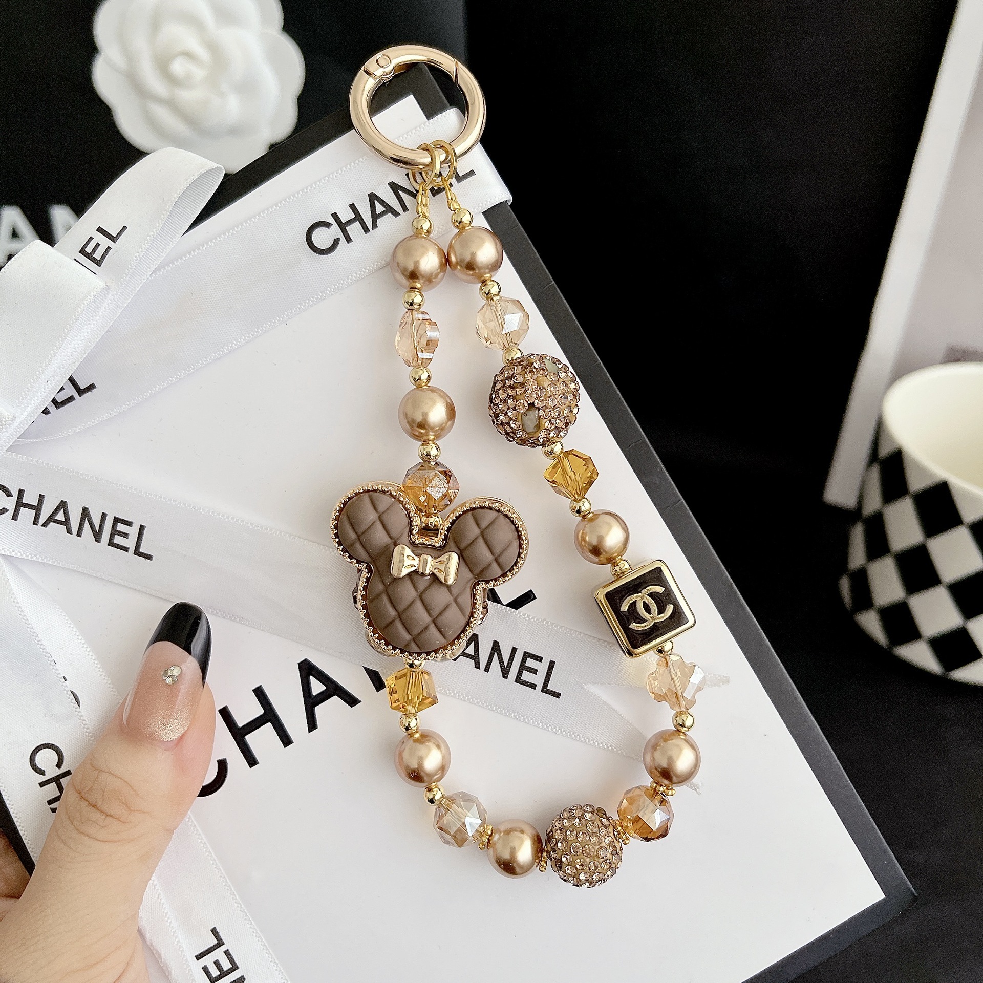 Hecha a mano y de alta calidad, colgante de teléfono móvil, pulsera de moda de micromecha, colgante de teléfono móvil corto.