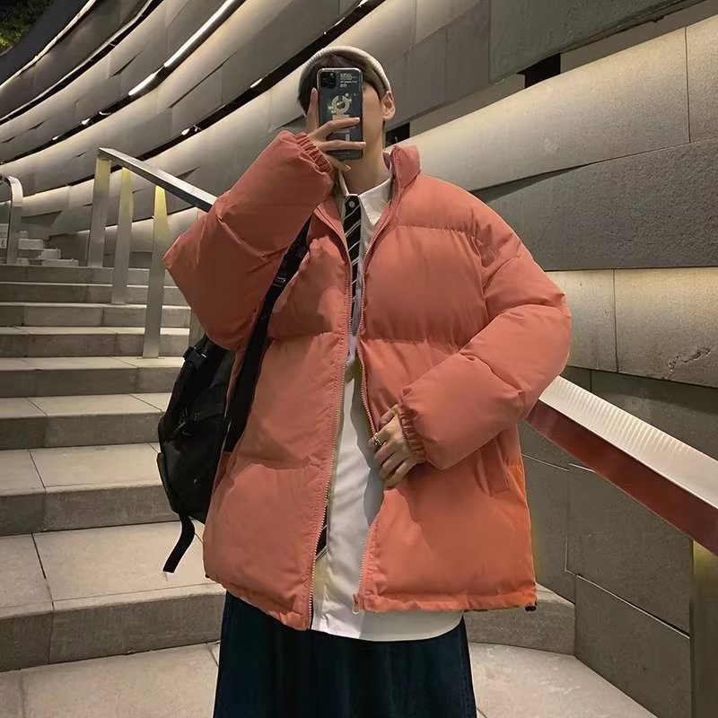 Abrigo de algodón acolchado para hombre de invierno engrosado 2022 nuevo color puro estilo de Hong Kong casual de moda Suelta todo fósforo abrigo de pan caliente