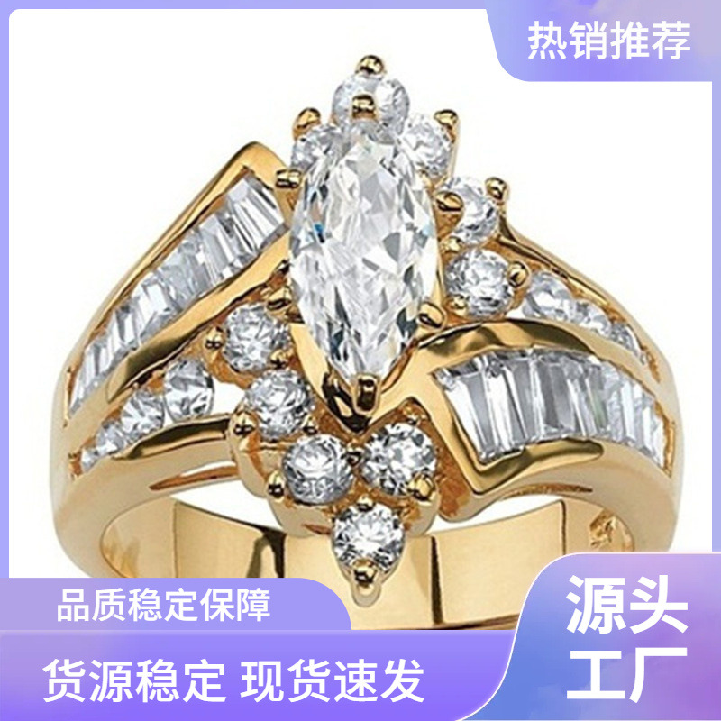 Golden fashionable wedding ring with zircon