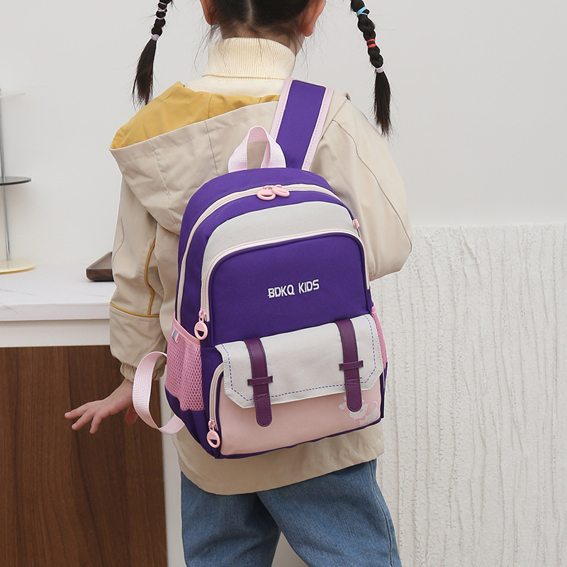 Mochila de gran capacidad para estudiantes de primaria mochila reductora de carga para niños y niñas de grado 1 y grado 2 mochila de comercio exterior jardín de infantes gran clase espalda