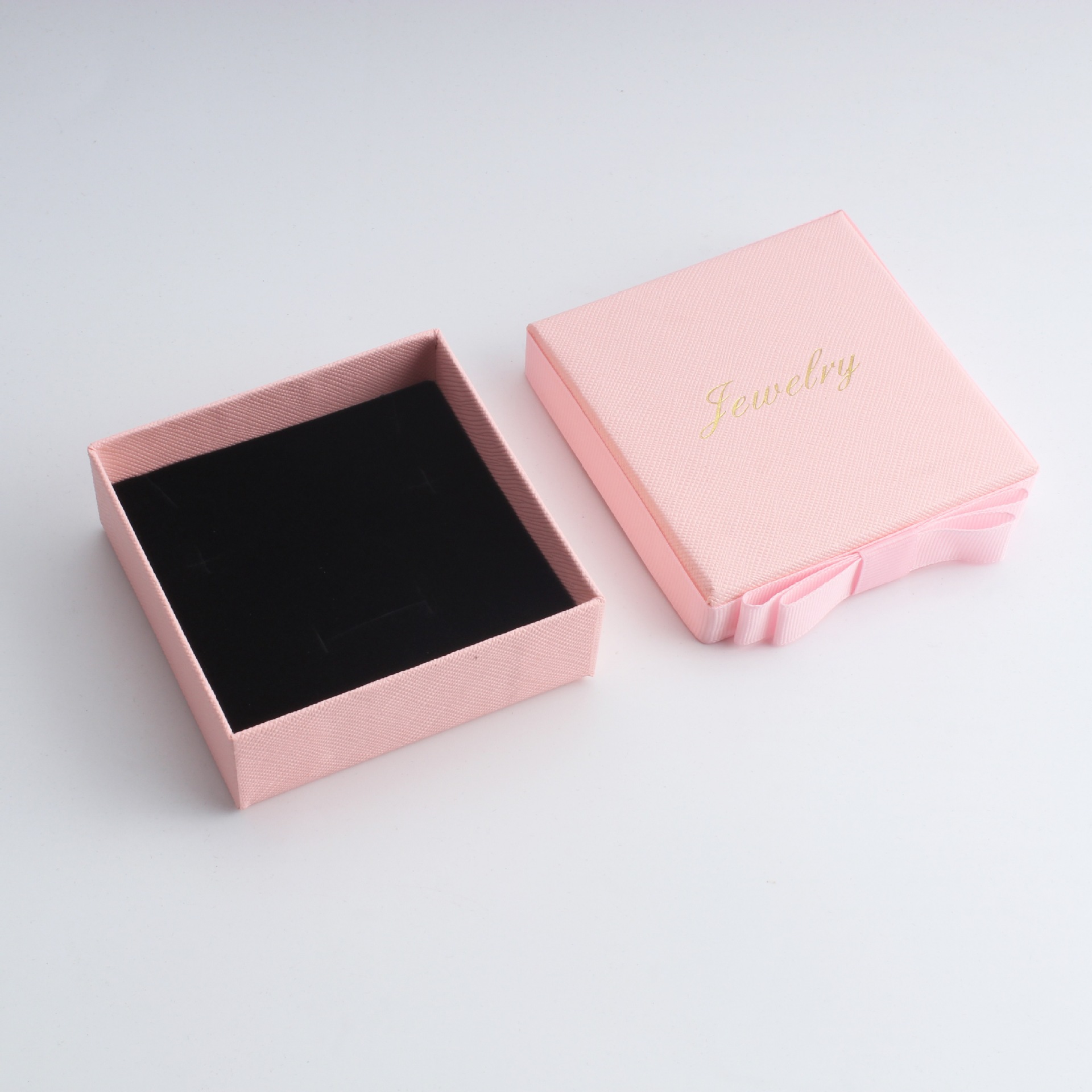 Inventario al por mayor arco cinta joyería embalaje de joyería caja de cartón simple anillo collar caja de regalo