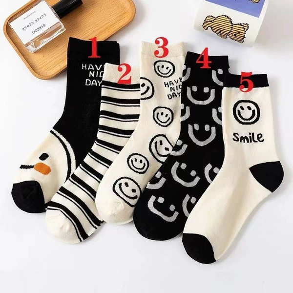 Black and white striped smiley face
