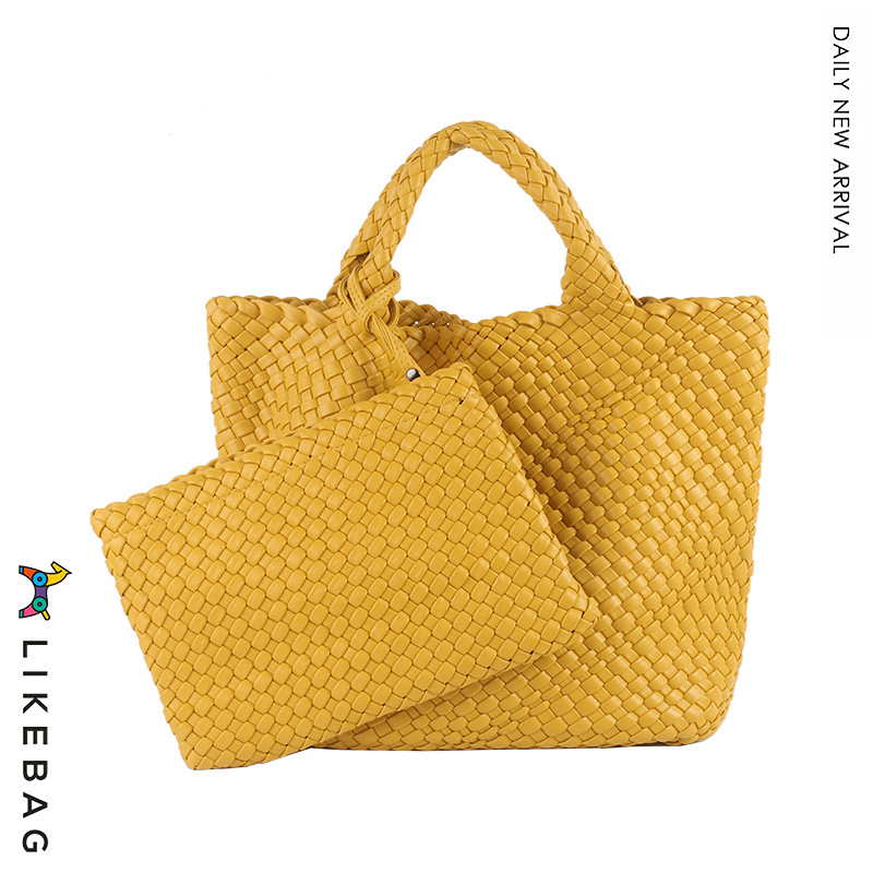 Bolso de mano de viajero de negocios transfronterizo bolso de mano de gran capacidad tejido PU 2022 nueva moda casual tejida Madre y niño bolsa