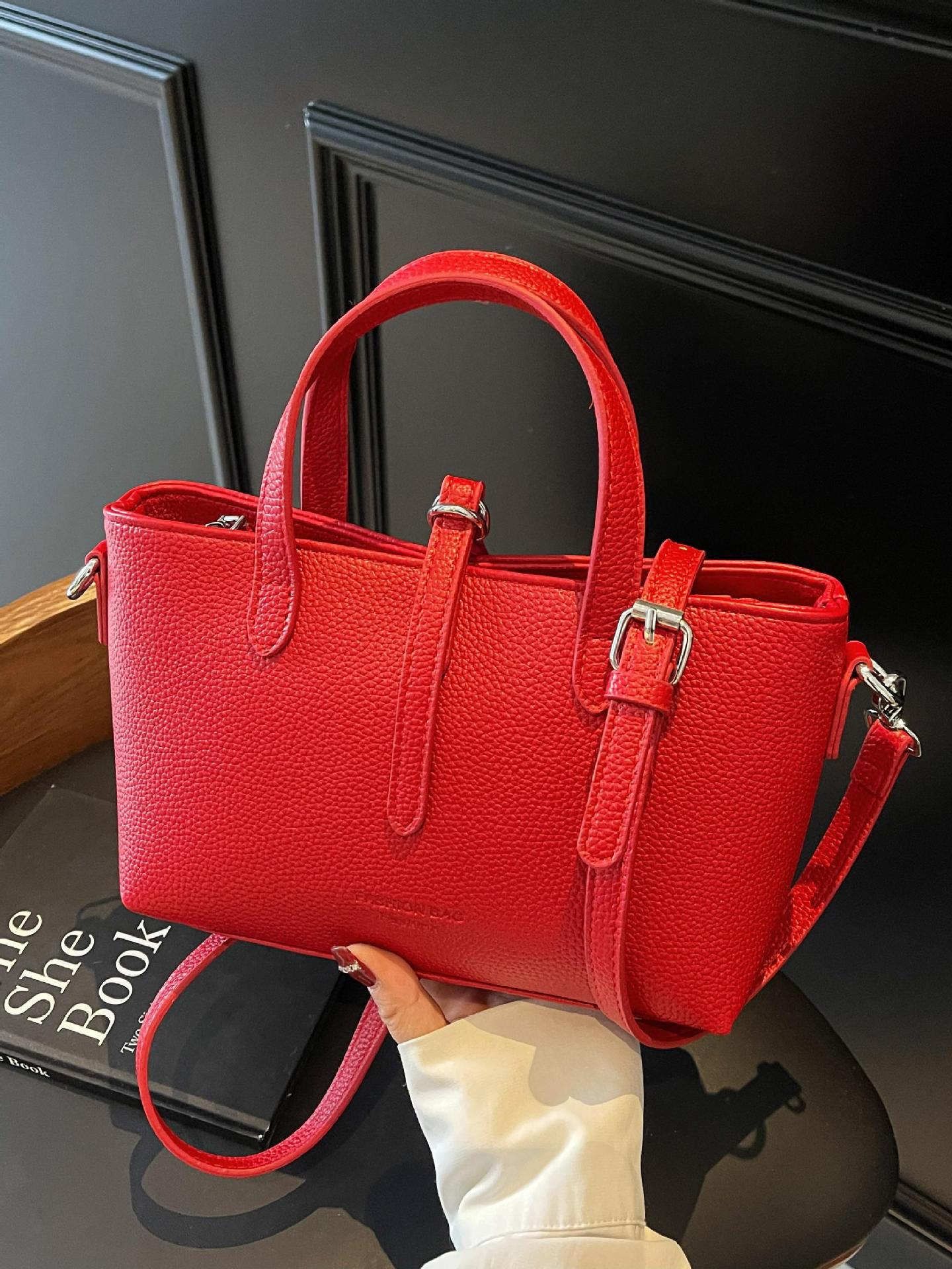 Bolso de mano simple de comercio exterior para mujer 2025 nuevo bolso de hombro de color sólido de todo fósforo bolso de mensajero de textura de moda popular