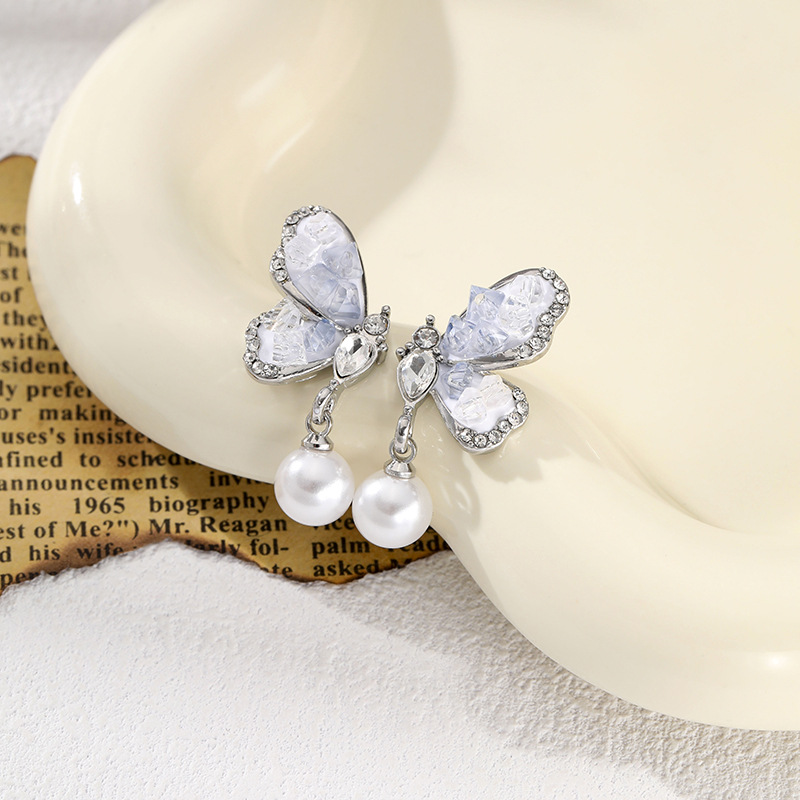 Nube brocado azul gradiente cristal mariposa pendientes de perla nicho diseño ligero de lujo alta sensación de pendientes