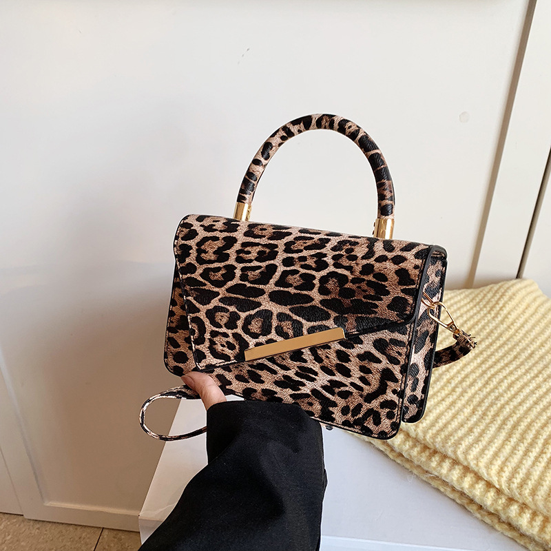 Textura de color contrastante empalme mochila de invierno 2024 nuevo estilo de moda de mujeres este año patrón de estampado mochila