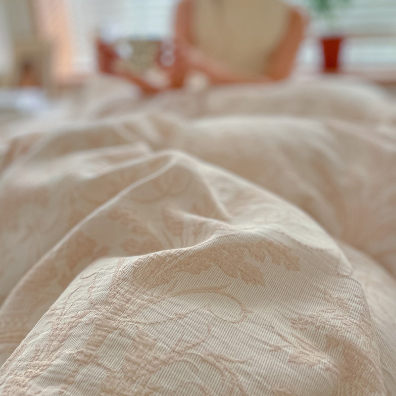 Clase ligera de lujo A algodón lavado de algodón de cuatro piezas de tres capas de hilo jacquard edredón cubierta sábana de algodón de fibra larga cama de algodón de cuatro piezas