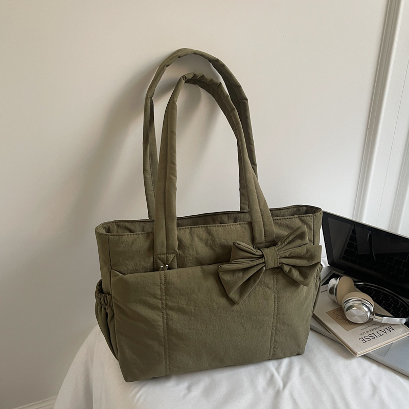 Bolso de lazo retro simple y ligero de color sólido bolso especial de costura de coche de moda femenino bolso de ropa de algodón de textura de hombro único bolso de moda