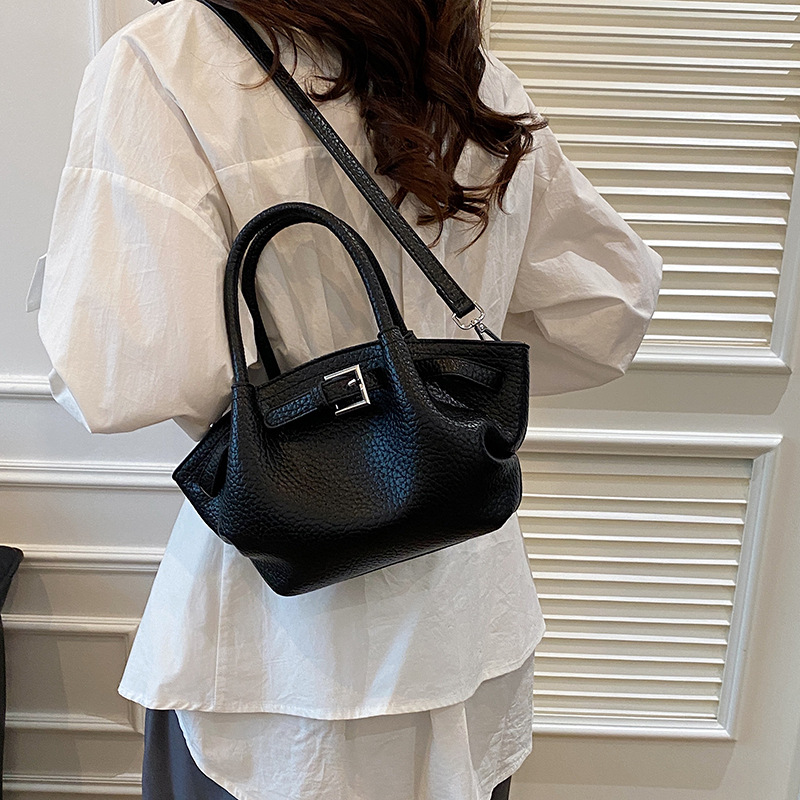 Bolso de textura transfronteriza 2025 verano nuevo estilo bolso de hombro con patrón de lichi bolso de mensajero casual de todo fósforo mujer