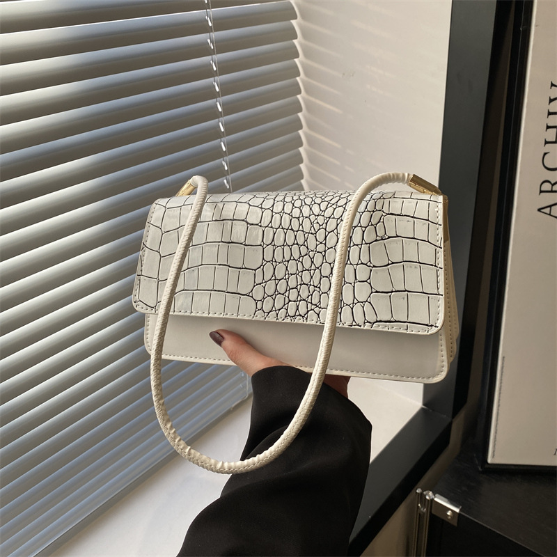 2025 primavera nuevo color sólido temperamento cocodrilo bolso de mano bolso de hombro de moda moda moda elegante bolso de mujer debajo de las axilas