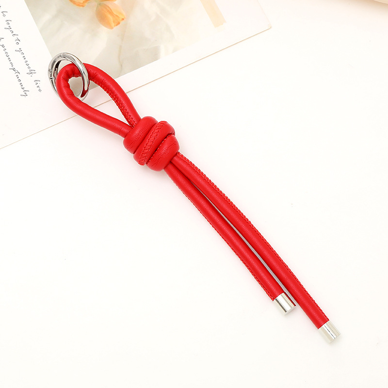 Nuevo tipo de cuerdas de cuero PU llavero colgante in bolsos de moda colgante cadena accesorios DIY tejido a mano