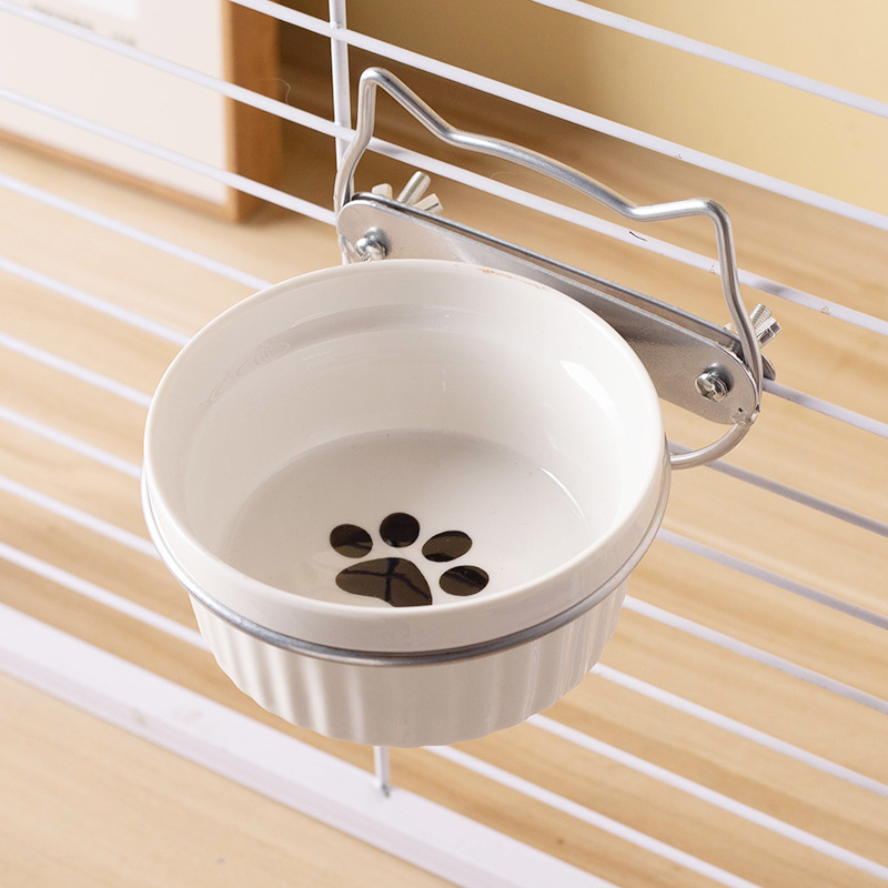 Estante de cabeza de gato de plata con tazón blanco