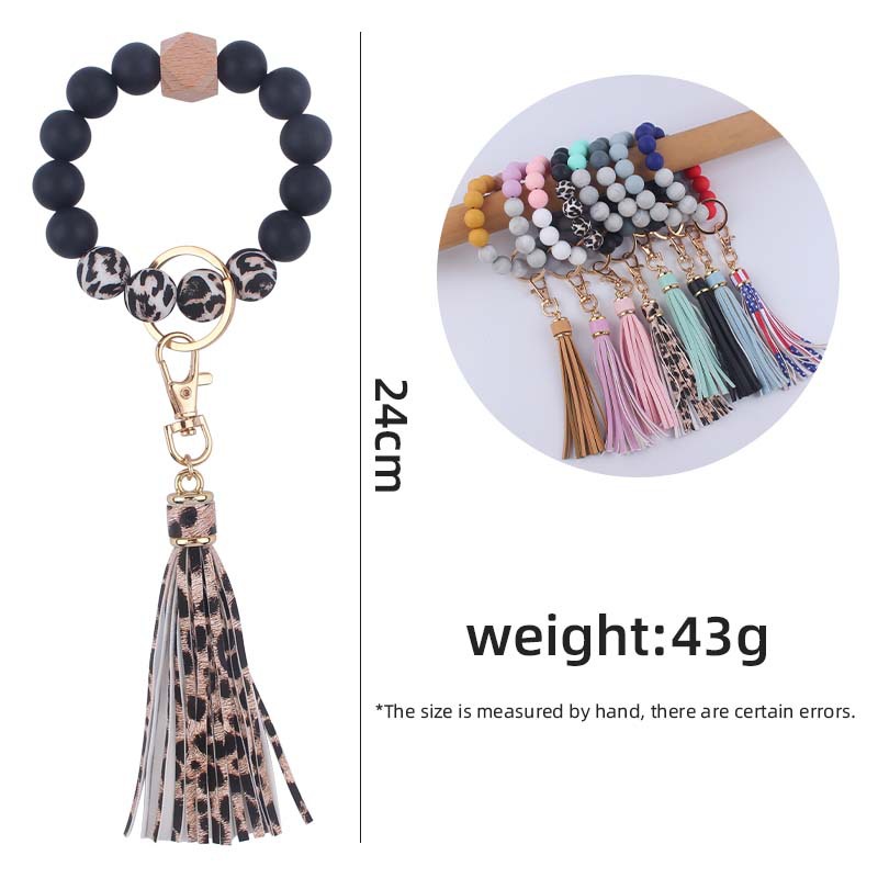 Creativo nuevo cuero pu borla colgante llavero silicona muñeca leopardo silicona pulsera llavero