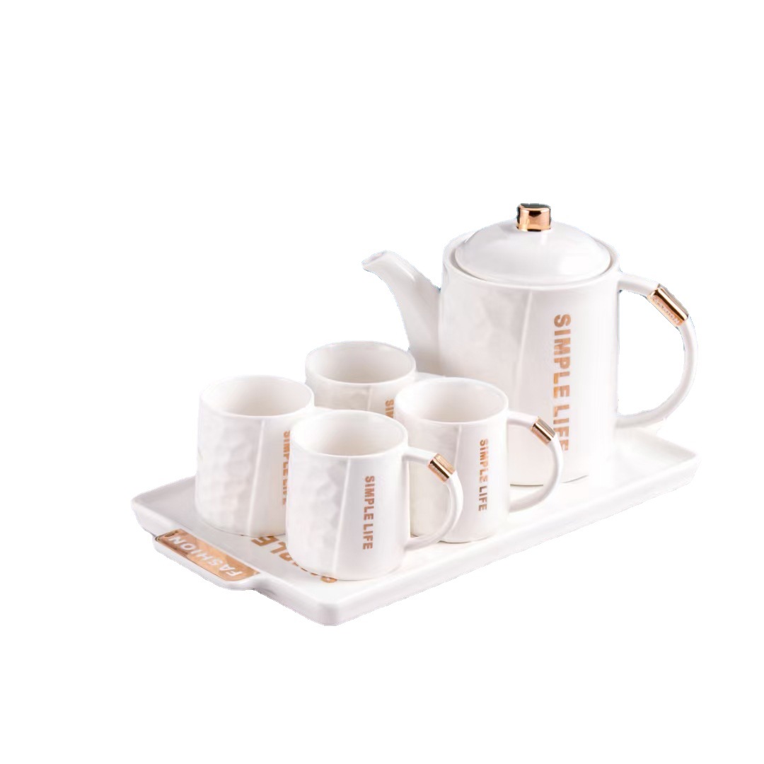 Estilo nórdico simple en relieve de cerámica botella agua fría combinación traje personalidad Oficina flor tetera con bandeja