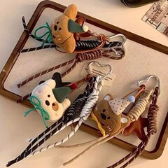 かわいいぬいぐるみの熊のストラップ ~ iu系風登山ロープの手紐アニメ人形バッグ掛け車のキーホルダー潮