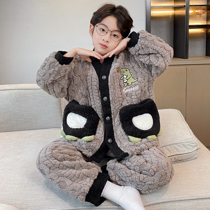 Pijamas de niños de invierno de nuevo estilo de mangas largas con cremallera de ropa cálida para el hogar simple para niños de tamaño medio y grande se pueden usar fuera