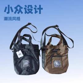 潮牌alo女士尼龙单肩斜挎包个性水桶包手提包男迷你化妆包手机包