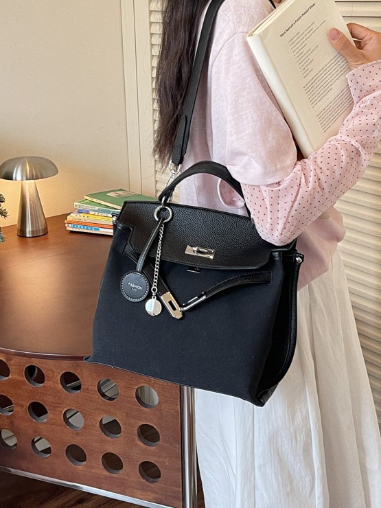 Bolso para mujeres 2026 nuevo cross-border lienzo empalme color contraste bolso de mano alta sensación retro mochila de hombro