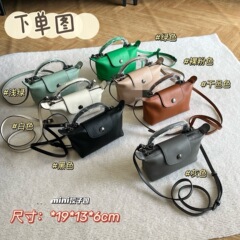 高品質の新しい Xtra 牛革ミニシングルハンドルクラッチバッグ女性のポータブルクロスボディ餃子バッグ大容量化粧品バッグ