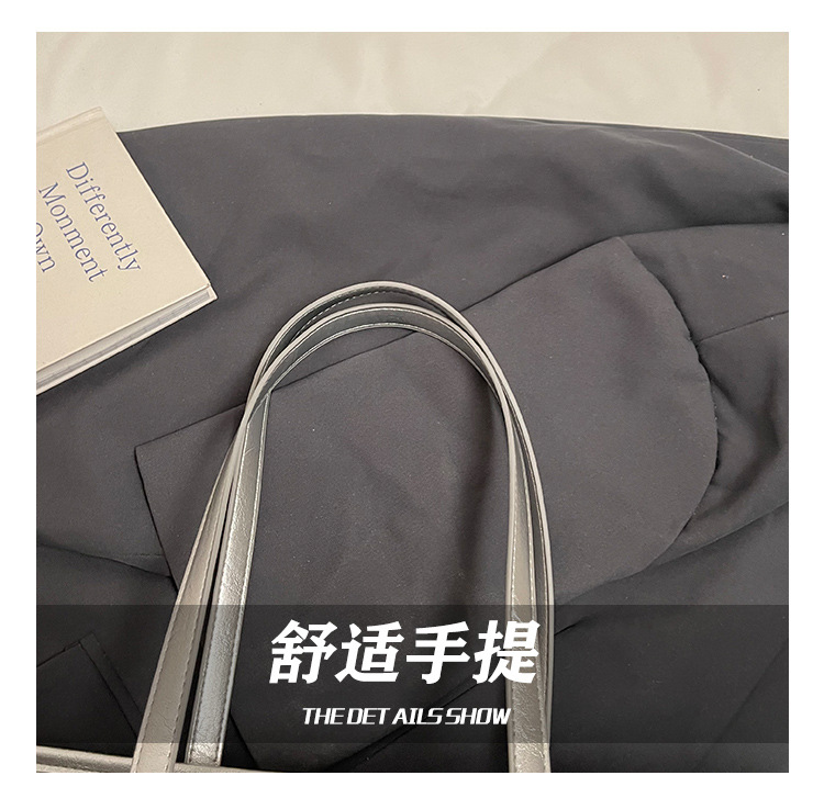The 2025 summer new stylish and simple tote bag is a casual and trendy large-capacity tote bag with a niche design for women undefined