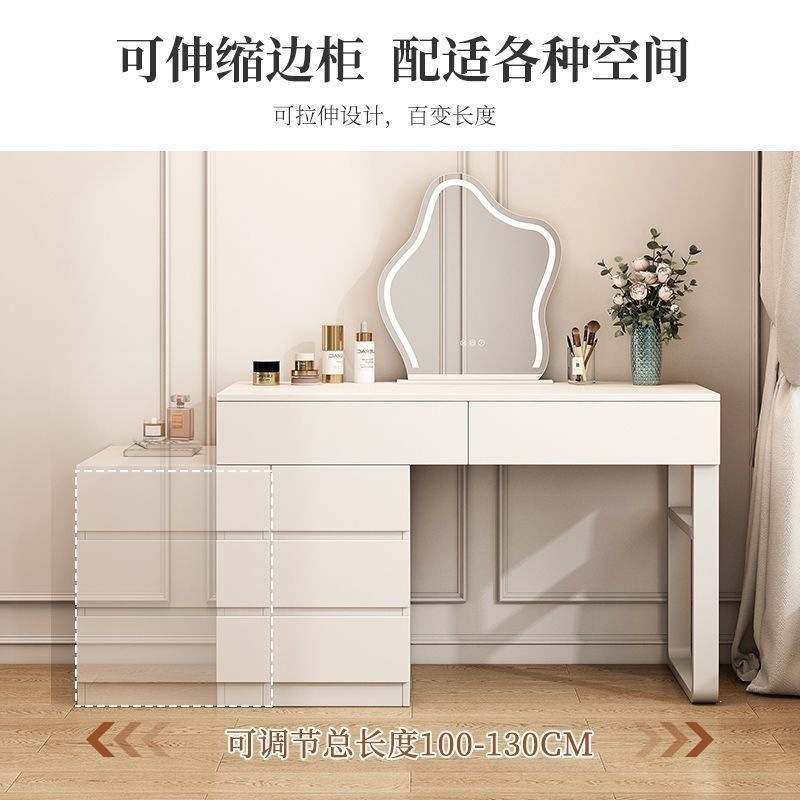 Wardrobe de madera maciza de tabla de roca dormitorio moderno simple pequeño tipo de lujo ligero de alta sensación armario de maquillaje en casa