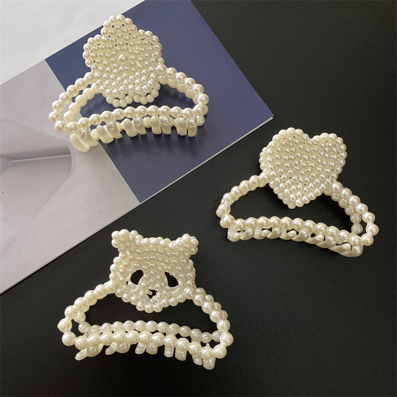 Corea del Sur Dongdaemun elegante perla clip de la cabeza accesorios para el cabello simple todo partido clip de tiburón francés horquilla roja neta