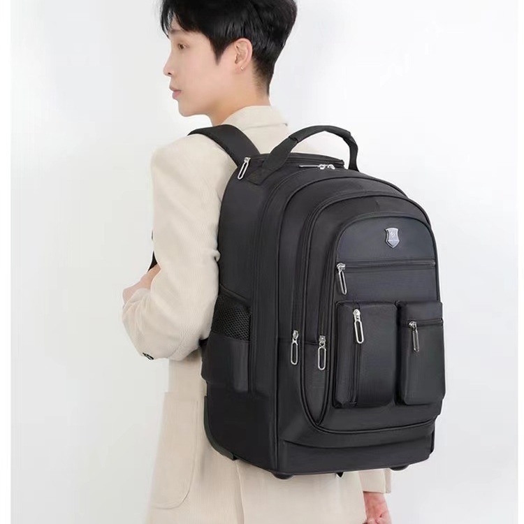 Mochila multifuncional de larga capacidad para hombres, mochila de viaje al aire libre, mochila de tracción de estudiantes, mochila de computadora