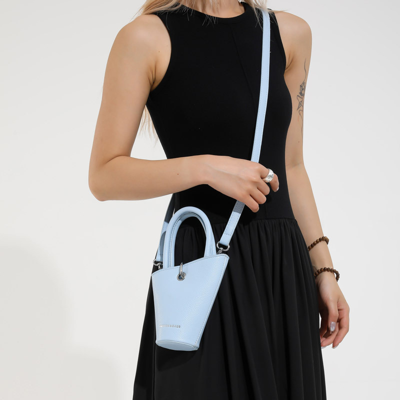 Bolso de cubo de diseño de nicho 2025 verano nuevo bolso de hombro con patrón de lichi mini bolso de mensajero de letras mujer