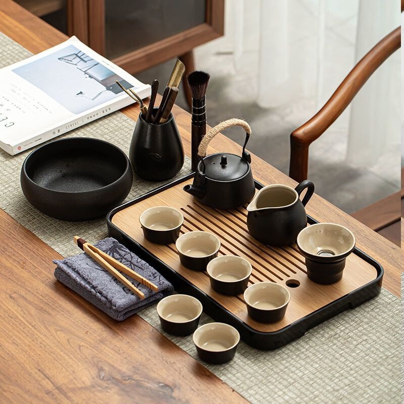 Black ceramic teapot with handle, tea cups, kung fu tea set, home use, Japanese style, simple modern design, one pot, six cups, tray, tea tray