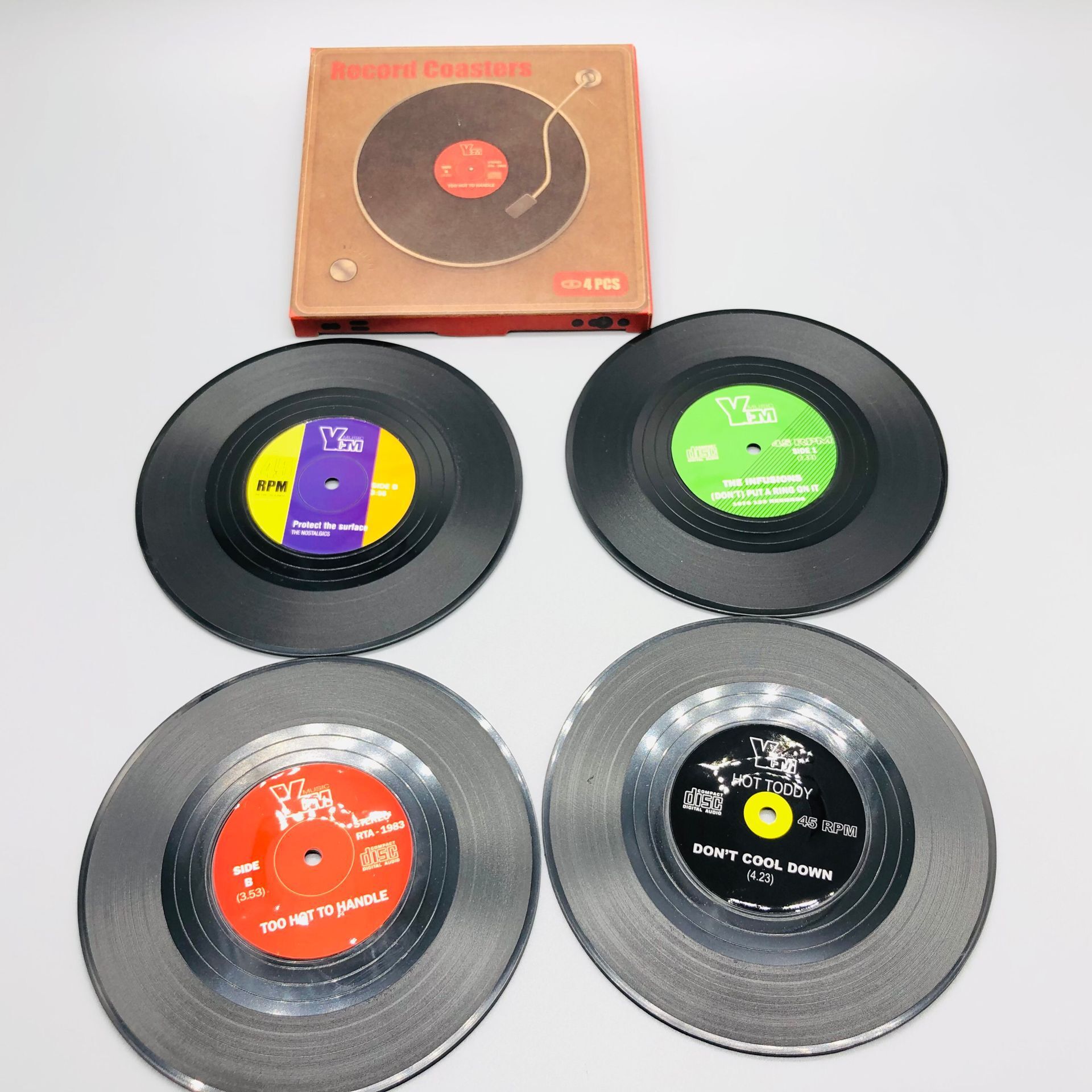 Venta caliente retro CD Coaster disco de vinilo cerveza bar estera de café de plástico taza de té estera productos transfronterizos ventas directas de la fábrica