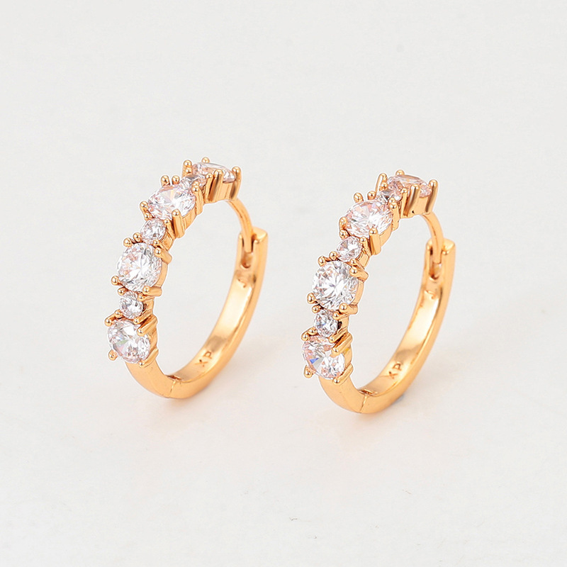 Xuping incrustado una sola fila de gemas artificiales aretes geométricos de aleación de cobre moda ligera lujo transfronterizo auriculares al por mayor mujeres