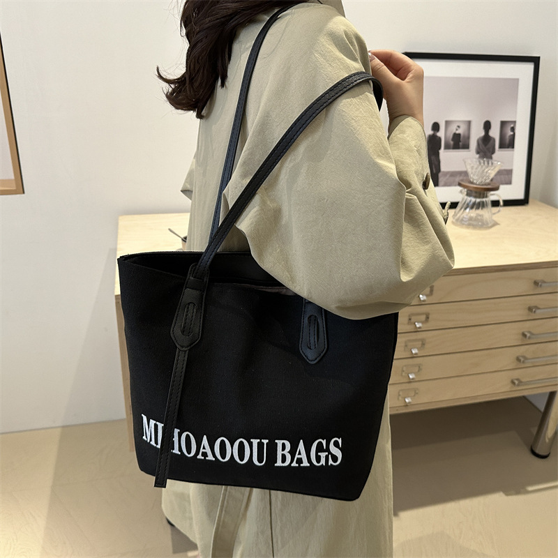 Bolsa de gran capacidad para mujeres 2024 otoño nuevo estilo de bolsa de lona universal bolso de hombro de viaje de estudiantes universitarios bolso de clase