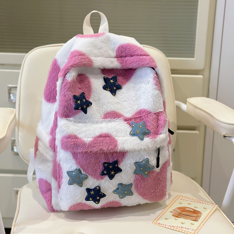 La versión coreana de la mochila de peluche es una mochila de doble hombro, el diseño de nicho japonés de la mochila de alto valor facial, la mochila de clase de las estudiantes universitarias.