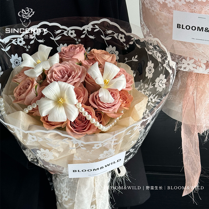 Papel de embalaje floral rosa de malla de película opp transparente de celofán de encaje de siete colores papel de embalaje de flores papel de embalaje de flores