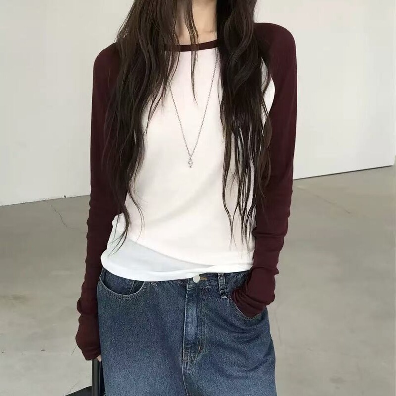 Now Korean designer nuese offers a color-blocked, raglan-sleeve long-sleeve T-shirt, a Korean-style women's top that is slimming and versatile