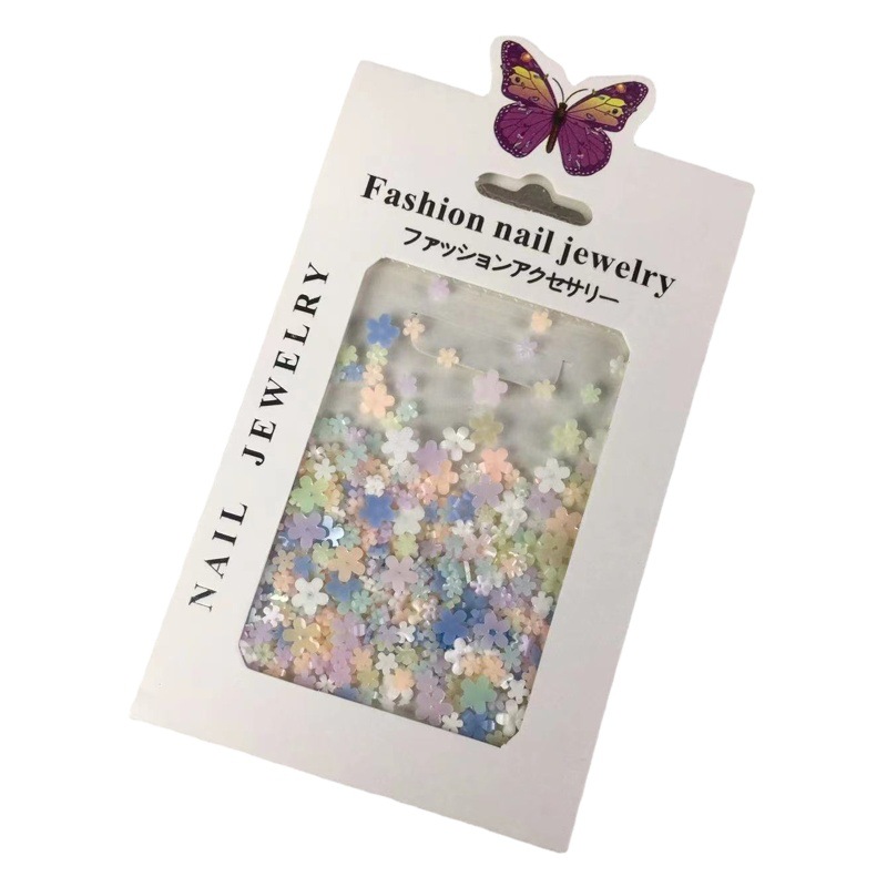 Resina de uñas joyas de flores que cambian de luz pequeña flor de cinco pétalos Flor de color claro decoraciones mixtas cuentas de acero Perla pequeña flor