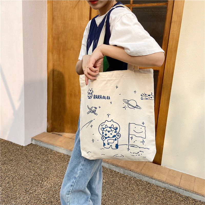 【 In Stock 】13173 Cute Moon Landing Cow single-shoulder Bag, student girls' schoolbag, canvas bag, large capacity wholesale undefined