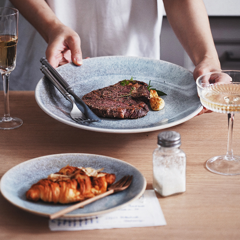 Vajilla de cambio de horno de estilo japonés, plato occidental de cerámica, plato de bistec doméstico, plato de verduras, plato plano, plato ligero, plato de pasta al por mayor