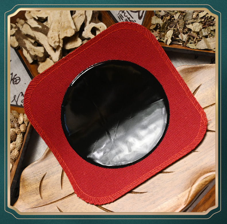 Traditional Handmade Black Herbal Plaster Patch for Neck Back and Knees 14x14cm Red Cloth Backing in use