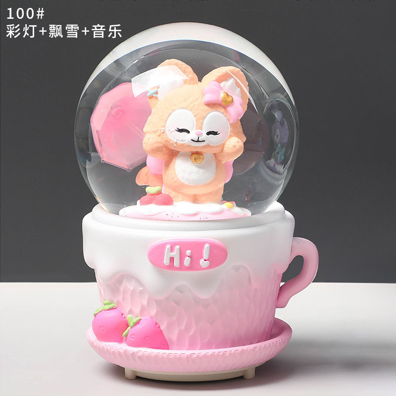 Pequeño libro rojo estilo caliente perro de orejas grandes bola de cristal caja de música nieve brillante niña dormitorio decoración de escritorio regalo