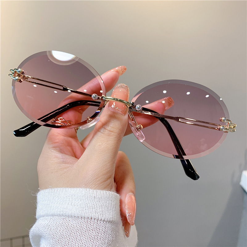 New Sunglasses Women's Oval Gradient Sunglasses Frameless Cutting Edge Trendy Glasses_voghion.com